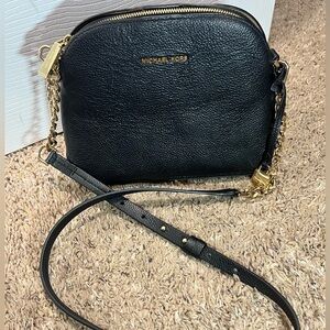 Black and gold Michael Kors crossbody bag